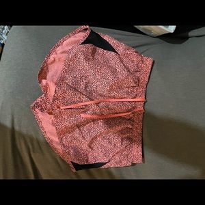 Medium Pink/black Nike print running shorts. Barely worn. Selling for $15.